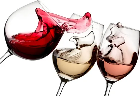 How do wine glasses enhance the drinking experience?